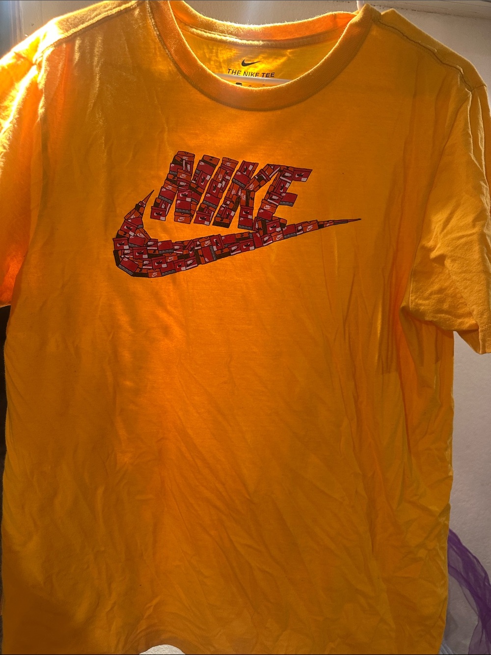Nike Yellow Tee with Red Patterned Swoosh